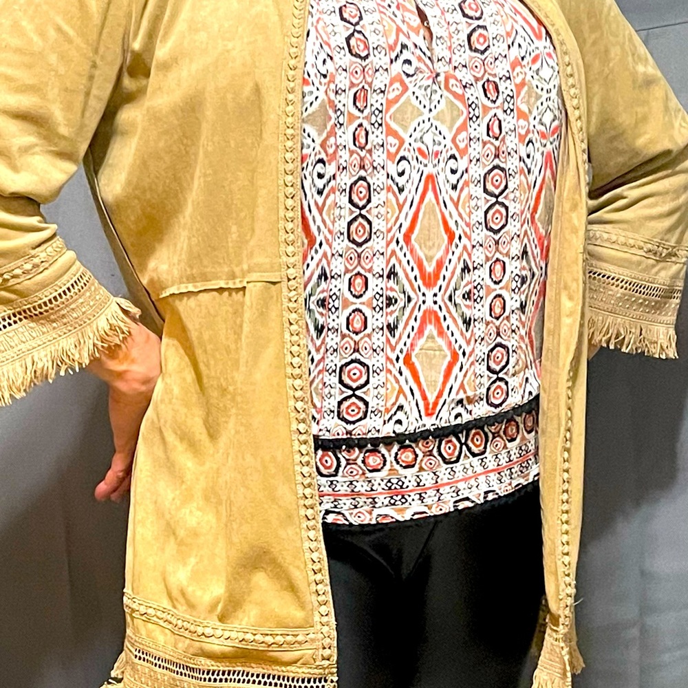 The throwback shawl jacket will make you feel European even in Ohio!!